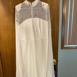 Elegant White Gown with Sheer Embellished Overlay